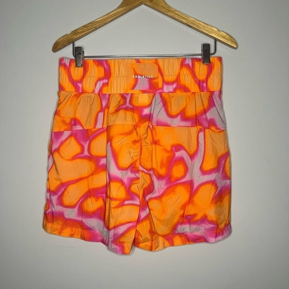 Fabletics Ultra High-Waisted Piped Nylon Short in Pink Escape Large - Picture 6 of 7